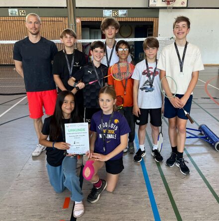 Students posing after a badminton tournament